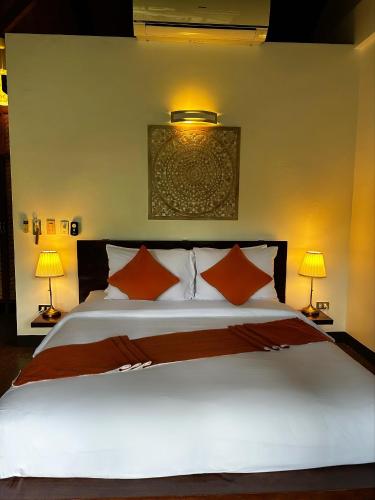 Letto o letti in una camera di Cadlao Resort and Restaurant