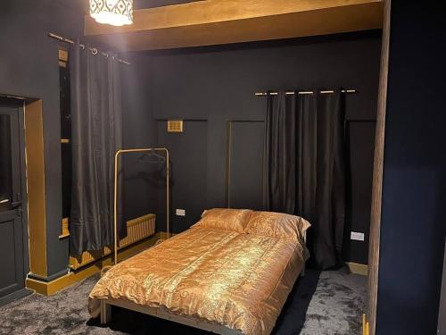 Ένα ή περισσότερα κρεβάτια σε δωμάτιο στο Beautiful 2-Bed Haven In Chelsea