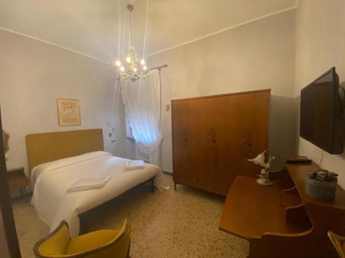 Postel nebo postele na pokoji v ubytování La casa del Professore - Downtown luxury stay