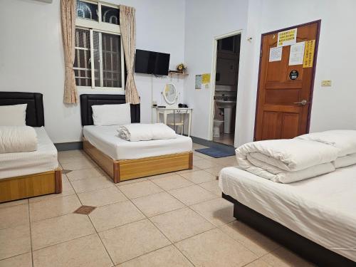 Postel nebo postele na pokoji v ubytování Fire B&B