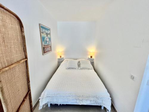 Voodi või voodid majutusasutuse Les jardins de la Croisette 6, by Welcome to Cannes toas
