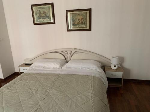 Ένα ή περισσότερα κρεβάτια σε δωμάτιο στο a casa di lu