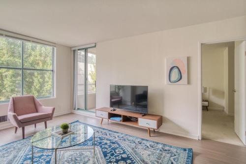 A television and/or entertainment centre at South Beach 1br w on-site shops restaurants SFO-1659