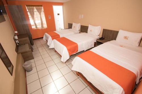 Postel nebo postele na pokoji v ubytování Hotel Sol de Belén Cajamarca