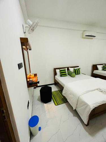 Ένα ή περισσότερα κρεβάτια σε δωμάτιο στο Beach heaven villa