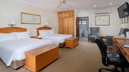 Una cama o camas en una habitación de Protea Hotel by Marriott Polokwane Ranch Resort
