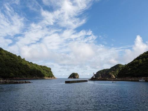 a large body of water with trees on both sides at RITA Izumo Sagiura in Izumo