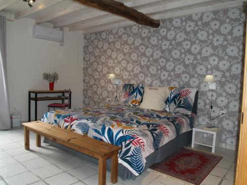Posteľ alebo postele v izbe v ubytovaní Maison Sarrau