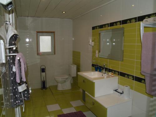 Kupaonica u objektu Maison Sarrau