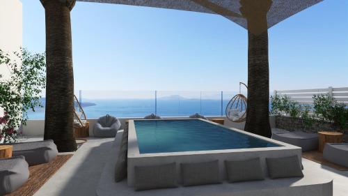 a swimming pool on a patio with a view of the ocean at Pietra e Mare - Mykonos Moments in Kalo Livadi