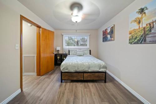 a bedroom with a bed in the middle of a room at Modern Cozy 1 Bedroom Apartment in Shelby Township in Shelby