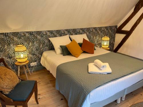 Giường trong phòng chung tại LA GUITOUNE