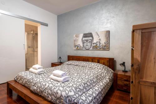 Katil atau katil-katil dalam bilik di Villa Torre Leporano a due passi dal mare