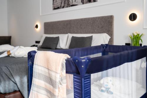 Postel nebo postele na pokoji v ubytování Hotel Conqueridor
