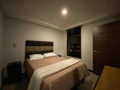 Cama o camas de una habitación en apartamento de lujo en zona viva