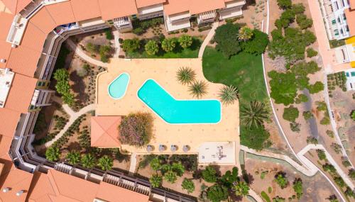 an aerial view of a resort yard with a pool at Sol & Lar No stress in Santa Maria