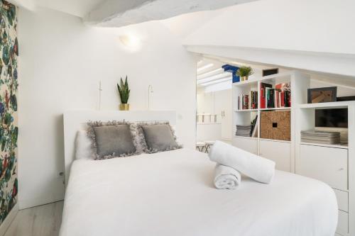 Кровать или кровати в номере dobohomes - Cava baja 2