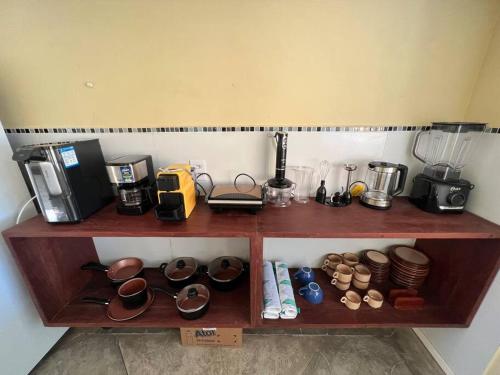 A cozinha ou cozinha compacta de Casa Girassol