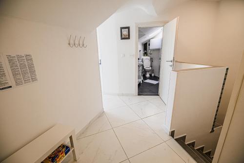 Kuchyň nebo kuchyňský kout v ubytování Apartments Rosana