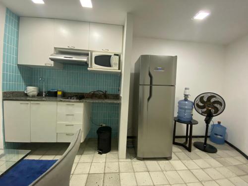 Virtuvė arba virtuvėlė apgyvendinimo įstaigoje Flat Golden Beach Recife