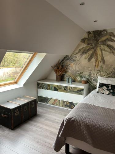 Letto o letti in una camera di Le relais du bord de seine