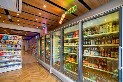 a grocery store aisle with a lot of drinks at Exclusive Villa * private Beach and Housekeeping in Punta Cana