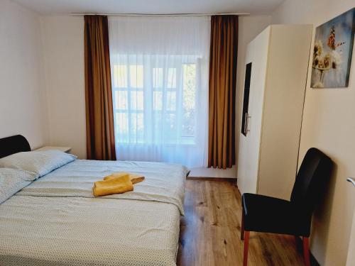 Ένα ή περισσότερα κρεβάτια σε δωμάτιο στο Balaton Apartman Füred