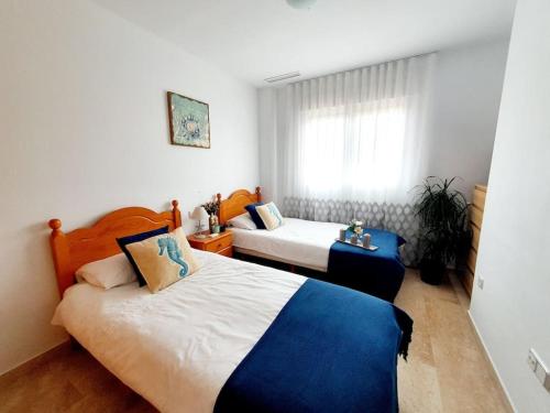 Кровать или кровати в номере Casa Simon United Golf La Tercia