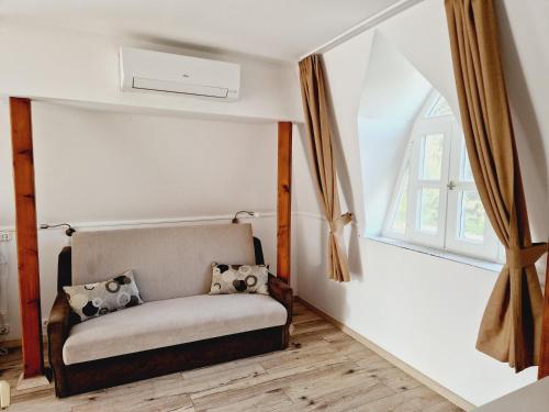 Ένα ή περισσότερα κρεβάτια σε δωμάτιο στο Balaton Apartman Füred