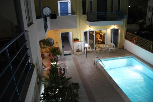 an aerial view of a house with a swimming pool at Olympic Star in Hersonissos