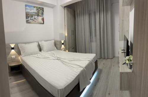 Ένα ή περισσότερα κρεβάτια σε δωμάτιο στο CELINE CONFORT N. D. COCEA