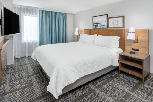 Ένα ή περισσότερα κρεβάτια σε δωμάτιο στο Staybridge Suites Denver - Cherry Creek by IHG