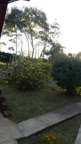 Taman di luar CHALES Canto dos Pássaros