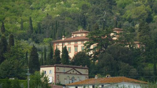 a large house on top of a mountain at Al Vecchio Leccio in Pistoia