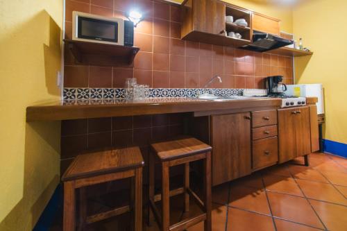 ครัวหรือมุมครัวของ Hotel Suites Del Centro