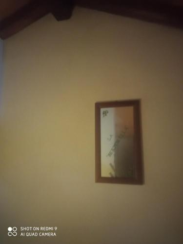 a picture on the wall of a room at Agri BERTORELLA in Cuneo