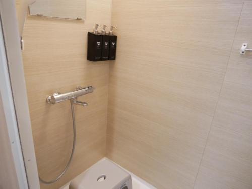 a bathroom with a shower with a toilet and a sink at HOOD - Vacation STAY 46035v in Amami