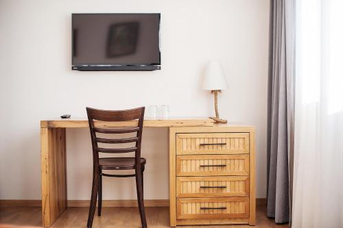 TV a/nebo společenská místnost v ubytování Monte Hotel