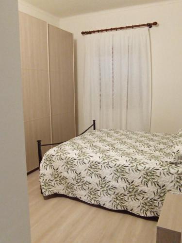 מיטה או מיטות בחדר ב-La Casa di Abe - Cuneo