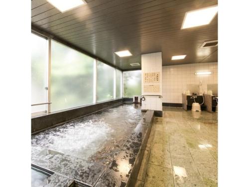 a room with a pool of water in a building at Hotel Crystal Palace - Vacation STAY 61203v in Hitachinaka