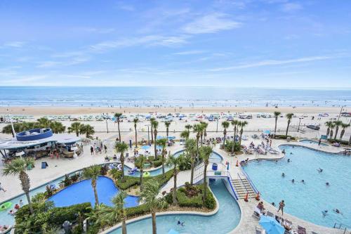 an aerial view of the beach at a resort at Luxury 12th Floor 2 BR Condo Direct Oceanfront Wyndham Ocean Walk Resort Daytona Beach | 1201 in Daytona Beach