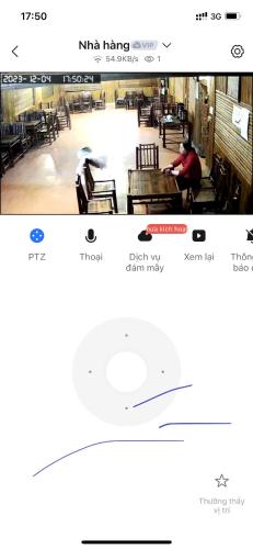 a screenshot of a website with a man sitting at a table at Dao Homestay in Hoàng Su Phì
