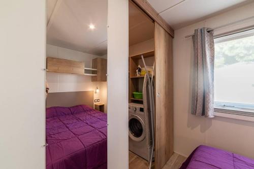 Postel nebo postele na pokoji v ubytování Mobil Home Luxe 3 chambres climatisé Canet en Roussillon