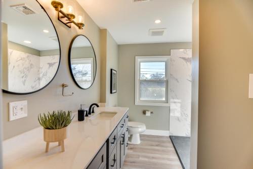 a bathroom with a sink and a mirror at Pet-Friendly South Kingstown Home 5 Mi to Beach! in South Kingstown