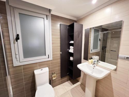 Ett badrum på Apartamento Europa Prados - Atenea