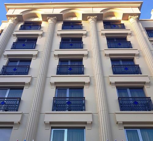 a facade of a building with balconies at OTEL MARCELLO in Istanbul