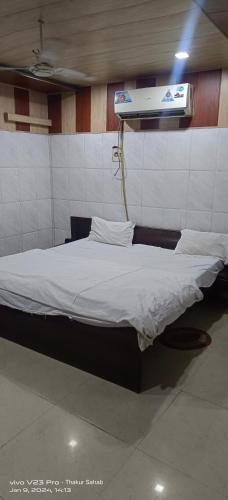 a hospital room with a bed in a room at Hotel Krishna palace in Lucknow