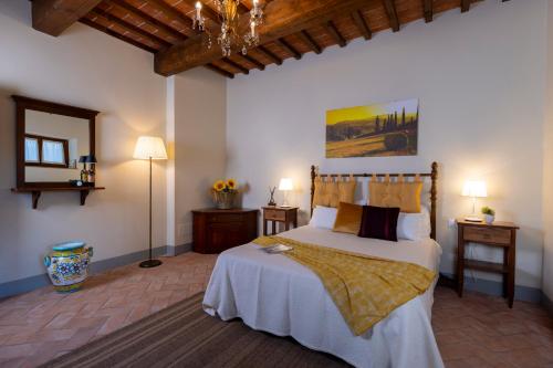 מיטה או מיטות בחדר ב-Podere La Casella