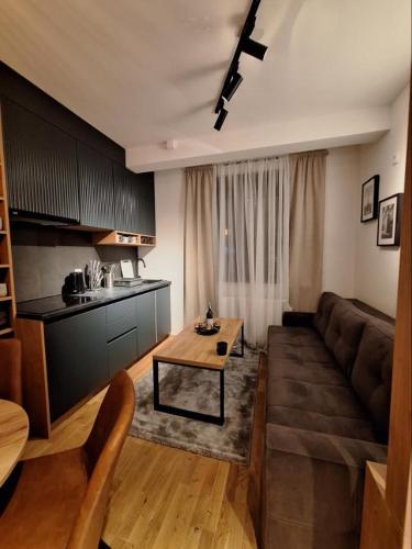 Posezení v ubytování Grand Casa Apartments