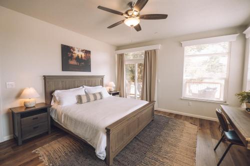 a bedroom with a bed and a ceiling fan at Ranch House at Galway Downs in Temecula